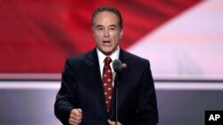 FILE - Rep. Chris Collins, R-NY., speaks during the second day of the Republican National Convention in Cleveland, July 19, 2016. 