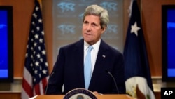 Menteri Luar Negeri AS John Kerry memberi keterangan mengenai Irak dan ISIS di Washington (8/9). (AP/Susan Walsh)