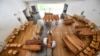 Coffins arriving from the Bergamo area, where the coronavirus infections caused many victims, are being unloaded from a military truck that transported them in the cemetery of Cinisello Balsamo, near Milan in Northern Italy, March 27, 2020. 