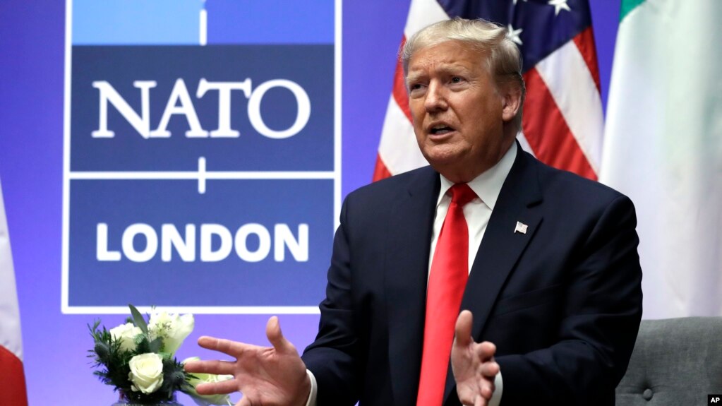 FILE - Then-President Donald Trump speaks during a NATO summit at The Grove, in Watford, England. Dec. 4, 2019. Trump on Feb. 10, 2024, said he would encourage Russia to attack alliance members who he feels are not contributing enough to the common defense.