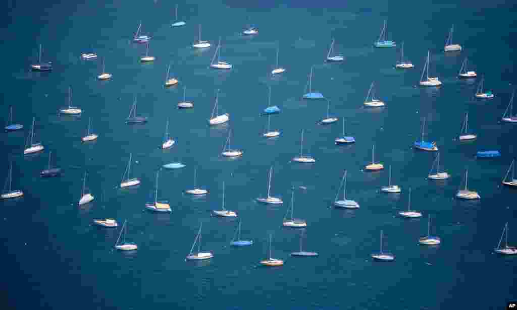 Sailing boats anchor on lake Bodensee in Konstanz, Germany.
