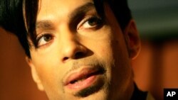 FILE - Recording artist Prince speaks during a news conference about his recording agreement between himself and Universal Records and his new single "Te Amo Corazon," Beverly Hills, California, Dec. 13, 2005.