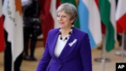 La primera ministra británica, Theresa May, es vista a su arribo al edificio de la Unión Europea, en Bruselas, el jueves, 22 de marzo, de 2018.