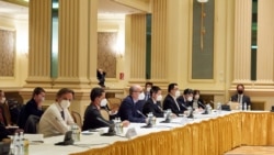 Delegation members from the parties to the Iran nuclear deal – Germany, France, Britain, China, Russia and Iran – attend a meeting at the Grand Hotel of Vienna on May 1, 2021.