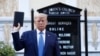 President Donald Trump holds a Bible as he visits outside St. John's Church across Lafayette Park from the White House Monday, June 1, 2020, in Washington. Park of the church was set on fire during protests on Sunday night. (AP Photo/Patrick…