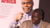 FILE - South Sudanese veteran journalist Alfred Taban Lo Gune addresses the crowd at the launch of the new VOA transmitter in Juba, South Sudan, March 21, 2013. (M. Davis Rwakaringi/VOA)