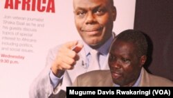 FILE - South Sudanese veteran journalist Alfred Taban Lo Gune addresses the crowd at the launch of the new VOA transmitter in Juba, South Sudan, March 21, 2013. (M. Davis Rwakaringi/VOA)