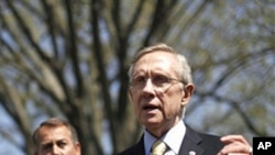 Senate Majority Leader Harry Reid (r) accompanied by House Speaker John Boehner of Ohio, talks to reporters outside the White House, April 7, 2011