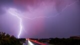 Lightning flashes through the sky over the A9 highway near Allershausen, southern Germany.