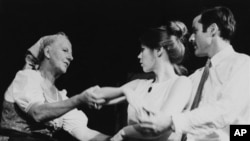 FILE - Baroness Maria Von Trapp rehearses Mary Small and Barney Hodges in a scene from the play “The Sound of Music,” which was based on her own life in Austria, Stowe, Vermont, Aug. 9, 1966.