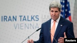 U.S. Secretary of State John Kerry speaks during a news conference in Vienna, July 15, 2014. 