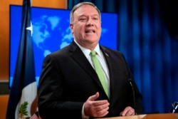 FILE - Secretary of State Mike Pompeo speaks during a press briefing at the State Department on May 20, 2020, in Washington.
