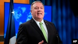 Secretary of State Mike Pompeo speaks during a news briefing at the State Department on May 20, 2020, in Washington. 