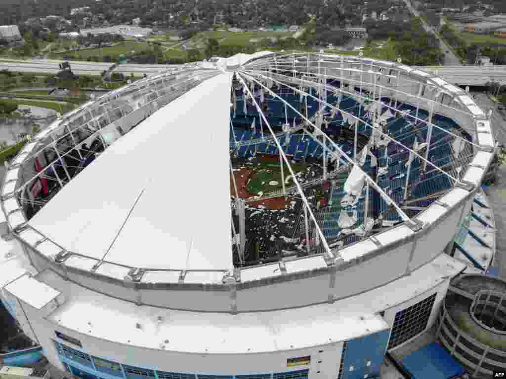 A drone image shows the dome of Tropicana Field which has been torn open due to Hurricane Milton in St. Petersburg, Florida.&nbsp;At least four people were confirmed killed as a result of two tornadoes triggered by Hurricane Milton on the east coast of the state of Florida, local authorities said.