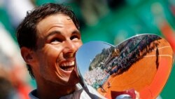 VOA Game Room - Rafa is tops in many ways, winning golf with your mind, saving water with Michael Phelps