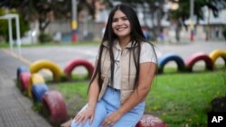 Venezuelan Kelybel Sivira poses for a photo in Bogota, Colombia, July 12, 2024. Half of Sivira's graduating class from law school in Venezuela has left the country, worn out, as she put it, by devoting so much of themselves to anti-government protests