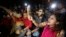 People chant slogans as they attend a sit-in protest at Shahbagh intersection demanding capital punishment for Bangladesh's Jamaat-e-Islami senior leader Abdul Quader Mollah after he won a dramatic stay of execution before he was due to be hanged in Dhaka