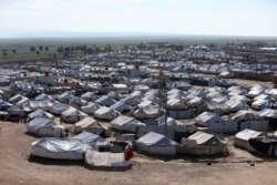 FILE - An April 2, 2019, photo shows a general view of the al-Hol displacement camp in Hasaka governorate, Syria.