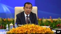 FILE - In this photo provided by An Khoun Sam Aun/Ministry of Information of Cambodia, Cambodian Prime Minister Hun Sen is seen during an online opening session of the Asia-Europe Meeting (ASEM) in Phnom Penh, Cambodia, Nov. 25, 2021. 