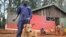 FILE - Dogs at Kenya’s KSPCA, which deals regularly with cases of rabies, get checked under a vaccination initiative. (H. Heuler/VOA News)