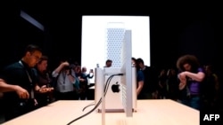 FILE - Apple's new Mac Pro sits on display in the showroom during Apple's Worldwide Developer Conference in San Jose, June 03, 2019.