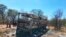 Emergency services stand near to a burned out bus after a bus accident in Gwanda about 550 kilometres south of the capital Harare, Nov. 16, 2018. Police in Zimbabwe say more than 40 people have been killed in a bus accident Thursday night.