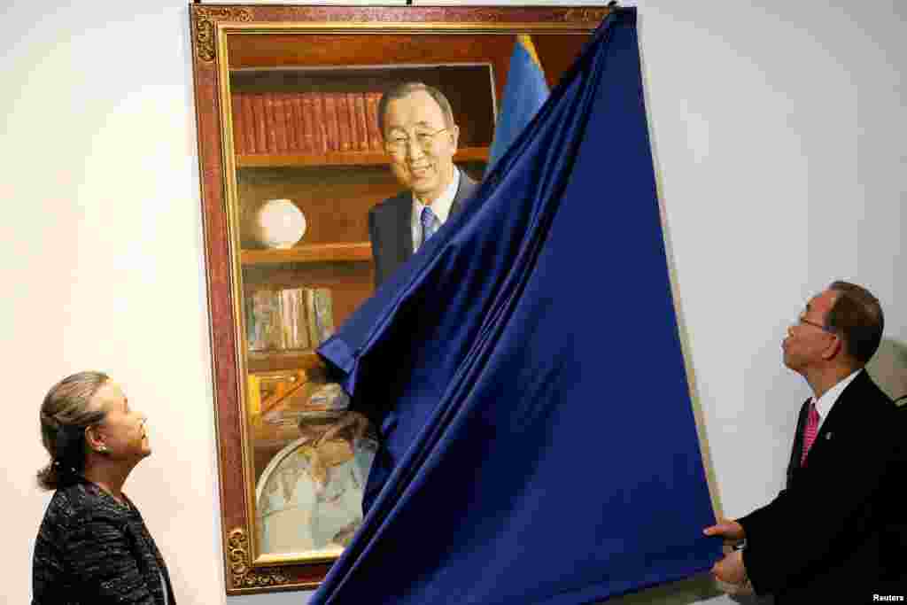 Outgoing United Nations Secretary-General Ban Ki-moon and his wife Yoo Soon-taek unveil his official portrait at United Nations headquarters in New York City.