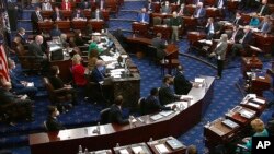 In this image from video, senators vote during the second impeachment trial of former President Donald Trump at the U.S. Capitol in Washington, Feb. 13, 2021. 