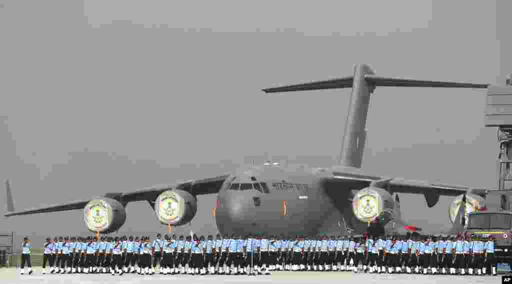 Indian Air Force soldiers march during the Indian Air Force day parade at the Hindon air base on the outskirts of New Delhi.