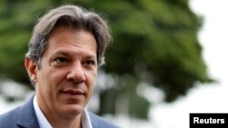 Workers Party vice presidential candidate Fernando Haddad, leaves the Federal Police headquarters, where Brazilian former President Luiz Inacio Lula da Silva is imprisoned, after visiting him, in Curitiba, Brazil, Sept. 3, 2018.