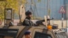 Indian paramilitary soldiers guard at the site of grenade explosion at a marketplace in Srinagar, Indian controlled Kashmir, Nov. 3, 2024.