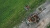 A destroyed Russian tank T-72 is seen in a field near the village of Budy, in Chernihiv region, Ukraine July 5, 2022. REUTERS/Valentyn Ogirenko