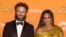 Seth Rogen and Singer Beyonce pose for photographers upon arrival at the 'Lion King' European premiere in central London, July 14, 2019. 