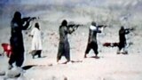 An image from a video dated June 19, 2001, shows members of Al-Qaeda training at their al-Farouq camp in Afghanistan.