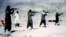 An image from a video dated June 19, 2001, shows members of Al-Qaeda training at their al-Farouq camp in Afghanistan.