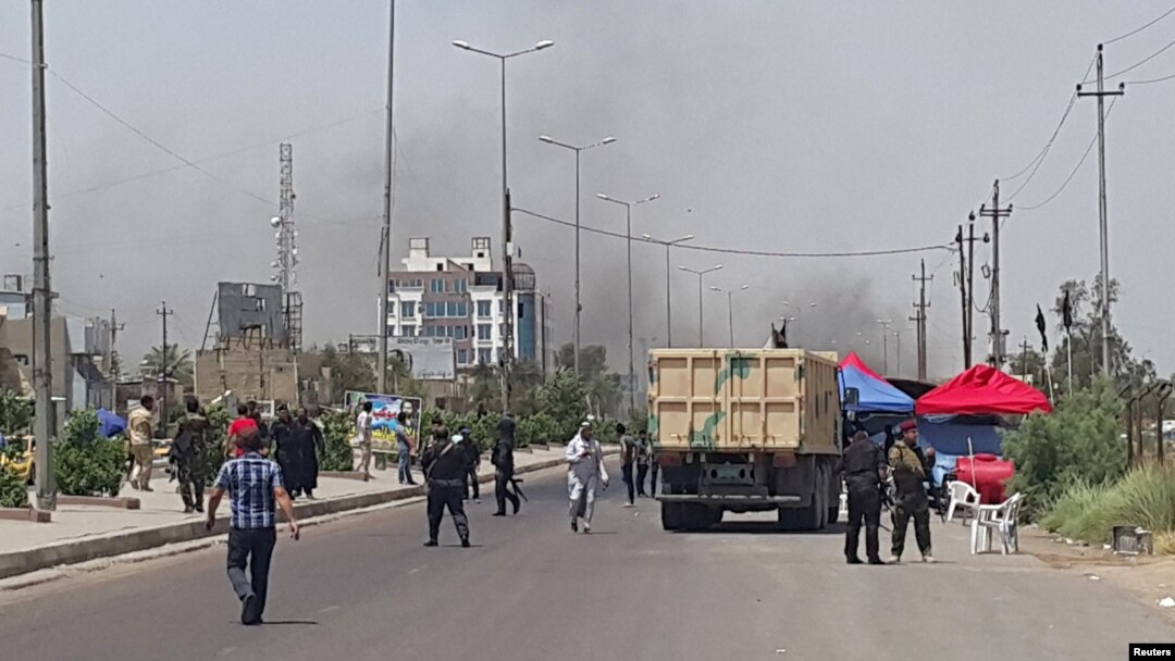 Smoke rises from a car bomb attack in the Saydiya district of southern Baghdad, May 2, 2016. 