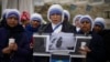 Nuns pray for Pope Francis in front of the Agostino Gemelli Polyclinic, in Rome, March 9, 2025. 