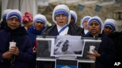 Nuns pray for Pope Francis in front of the Agostino Gemelli Polyclinic, in Rome, March 9, 2025. 