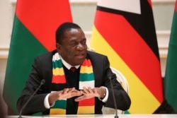 FILE - Zimbabwe's President Emmerson Mnangagwa speaks in Minsk, Belarus, Jan. 17, 2019.