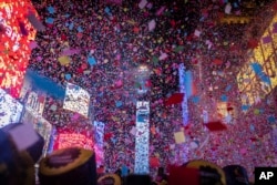 FILE - The Times Square New Year's Eve Ball drops during New Year's celebration in Times Square on Sunday, Jan. 1, 2023 in New York. (AP Photo/Stefan Jeremiah)