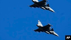 На фото : Шведські винищувачі JAS-39 Gripen на військових навчаннях Литва-НАТО