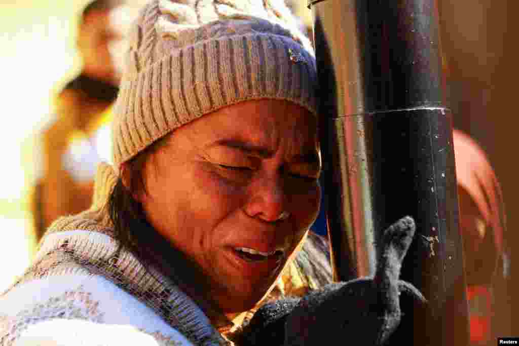 Margelis Tinoco, a migrant from Colombia, reacts after receiving news that her U.S. Customs and Border Protection (CBP) One appointment was cancelled on the inauguration day of Donald Trump&#39;s second presidential term, at the Paso del Norte International border bridge in Ciudad Juarez, Mexico, Jan. 20, 2025.