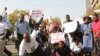Zimbabwean civil servants take part in a demonstration over poor salaries and working conditions in Harare, Tuesday, July, 24, 2012. (FILE 