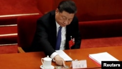 Çin Devlet Başkanı Xi Jinping de yasanın kabulü yönünde oy kullandı.