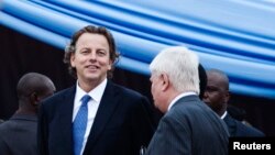 U.N. Special Representative to Mali, Albert Koenders (L), at a ceremony that marks the beginning of the 12,000-strong U.N. peacekeeping mission in Mali (MINUSMA) in Bamako, July 1, 2013