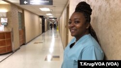 Christina Jones works full time as a housekeeper at a hospital in Jonesboro, Ark. The state's new minimum wage law will be implemented over three years, meaning Jones' salary will go up in 2021. Photo taken Dec. 3, 2018. (T.Krug/VOA)
