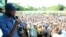 Incumbent Governor Adams Oshiomohole (L) speaks during a political rally at Emu in Edo State, June 13, 2012. 