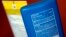FILE - Sunscreen ingredients, including oxybenzone, are shown, in San Jose, Calif., May 2, 2018. In an attempt to protect the coral reefs, the Pacific nation of Palau will soon ban many types of sunscreen. The law defines reef-toxic sunscreen as containing any one of 10 chemicals, including oxybenzone, and states that other chemicals may also be banned.