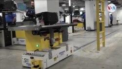 Robots en revisión de maletas en aeropuerto de Miami