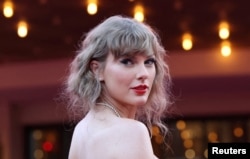 FILE — Taylor Swift photographed in Los Angeles, California, Oct. 11, 2023. She said via social media that she had a "shattered heart" after a fan died at her concert Friday night in Rio de Janeiro.